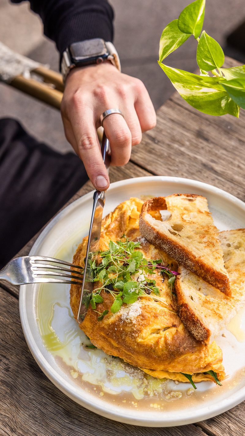 Folded omelette with herbs on a plate