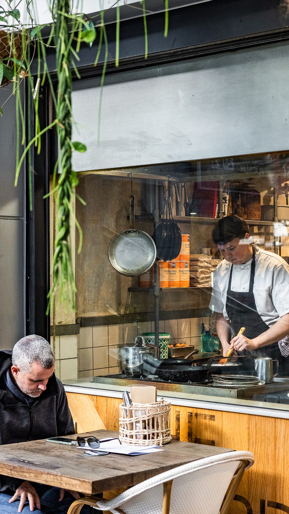 Chefs working in the open kitchen at The Gardens 259